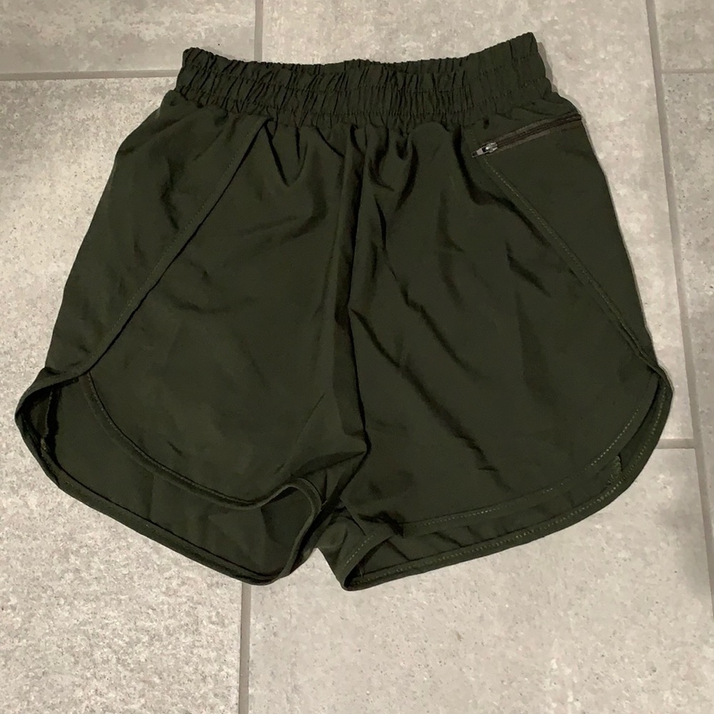 Green athletic shorts, Women’s Small never worn